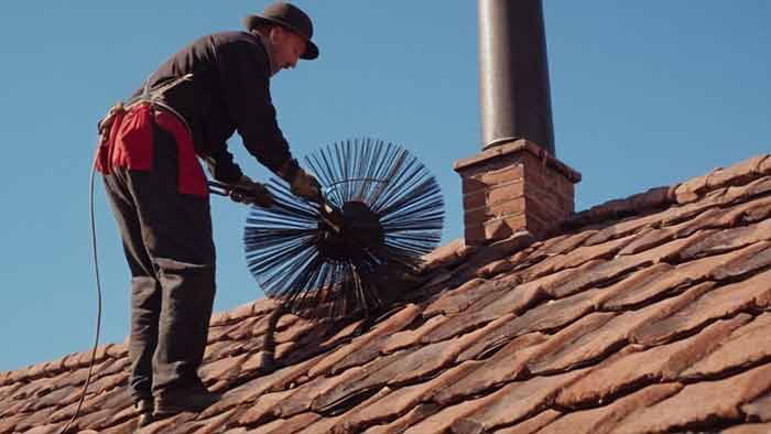 Creosote buildup removal from residential chimney boone co