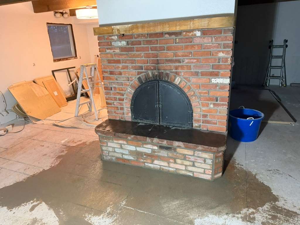 Rebuilding a Cracked Brick Fireplace Hearth