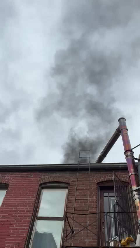 Smoke-testing a brick building chimney flue