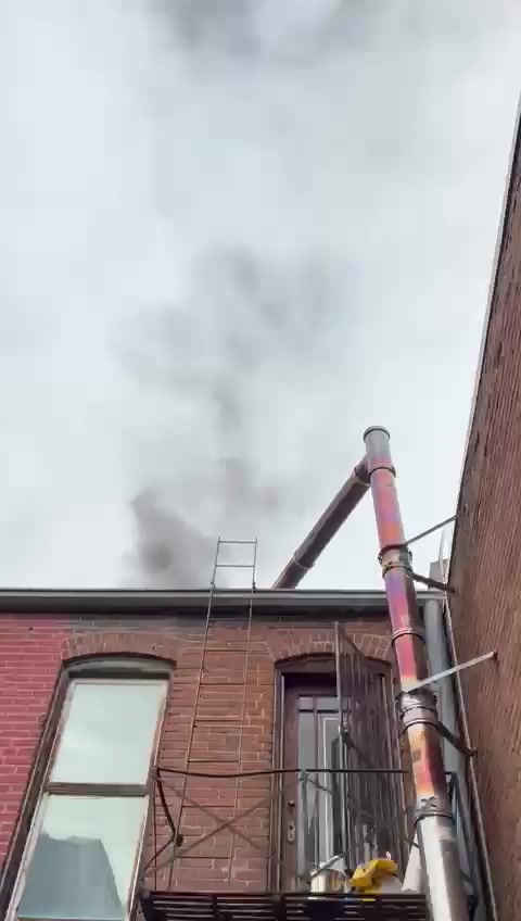 Commercial chimney masonry repair and tuckpointing on a Front Range building