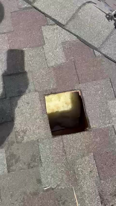 Cutting the roof opening for a new chimney flue