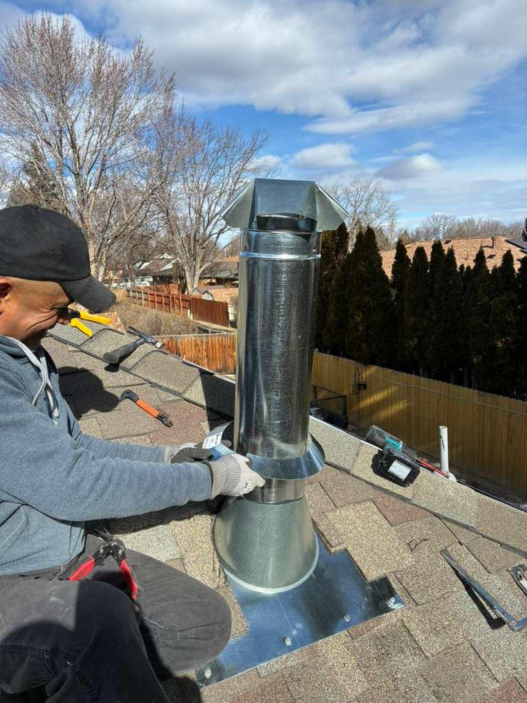 Installing the chimney pipe and rain cap