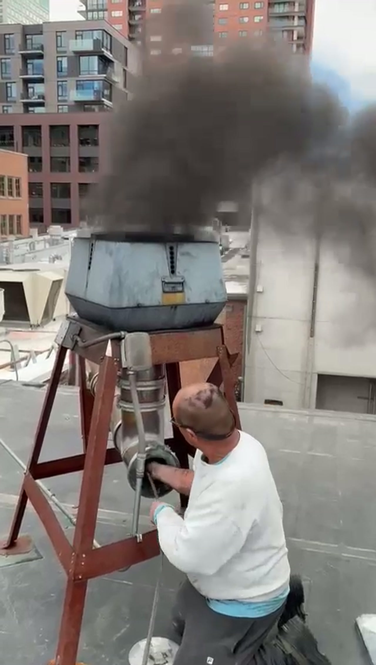 Adam Chimney Sweep at a soot-choked commercial pizza oven rooftop flue in Denver